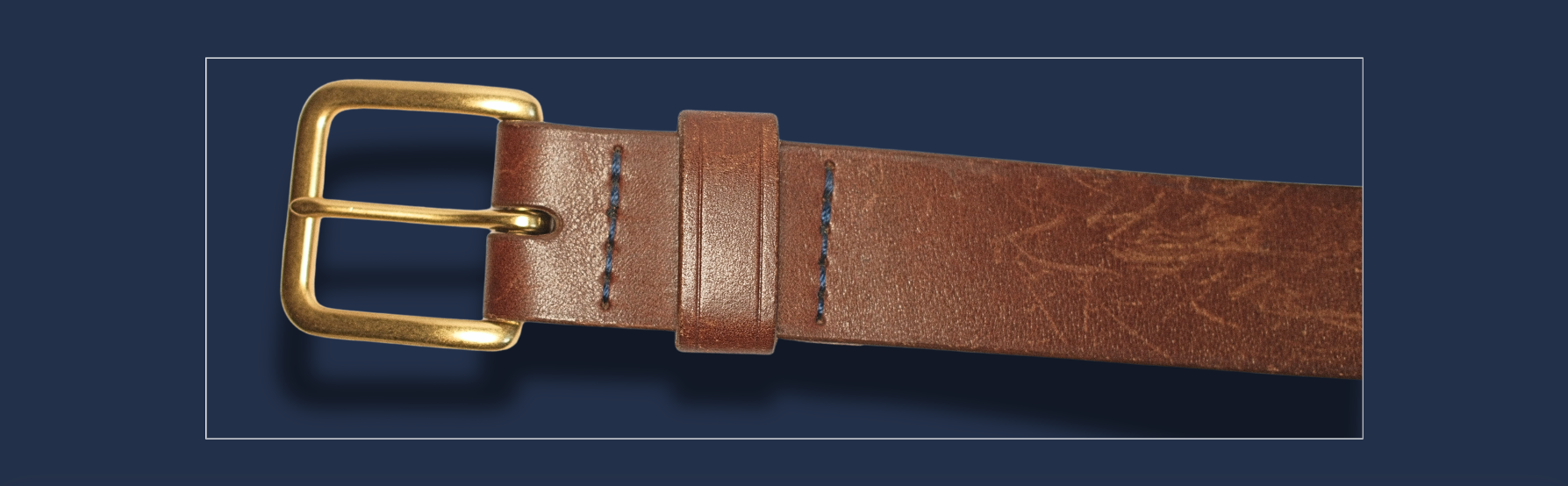 Leather belt with gold buckle